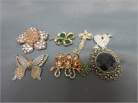 brooches.