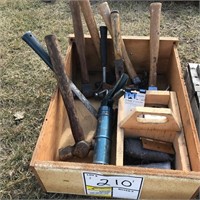 Box of hammers, caulking gun, tape measure