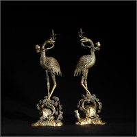 A pair of ancient bronze gilded beasts