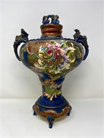 Floral decorated ceramic vase with cover