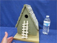 nice "a-frame" birdhouse (has white ladder)