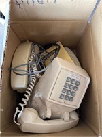 Box of vintage landline phones