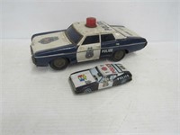 2 Tin Police cars