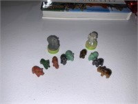 lot of small rhinoceros and elephant figures