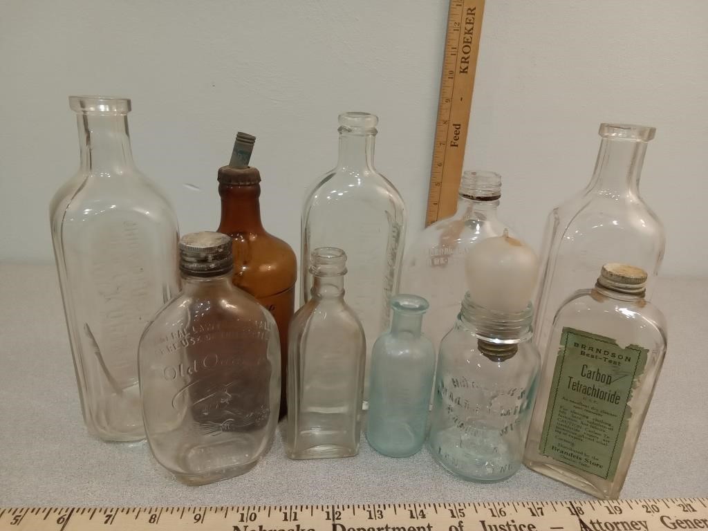 Glass bottles, Old Quaker, Dr. Peter's kuriko &