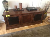 Cherry finished entertainment center w/ glass fron