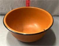 Orange and black enamelware bowl