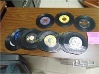 Vintage 45 RPM records including one Elvis and