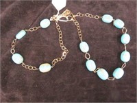 PAIR OF GOLD TONE AND TURQUOISE STONE NECKLACES