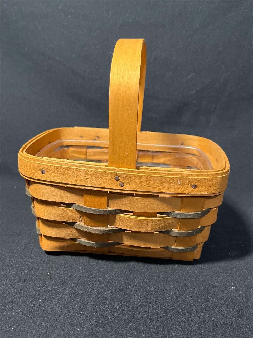 Small Longaberger Baskets, with protectors.