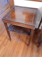MCM mahogany end table with leather look top and