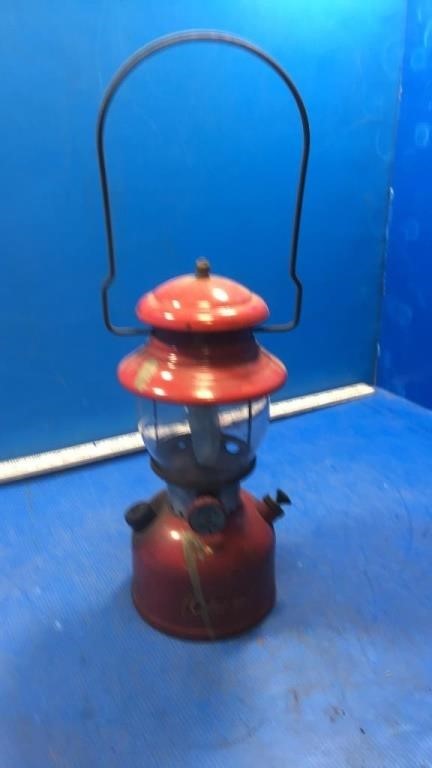 57 red Coleman lantern