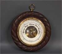 Nautical barometer with carved rope back