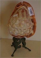 Carved conch shell lamp