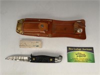 Knife with leather Sheath and Sharpening Stone