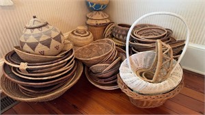 Large collection of woven African baskets, a few