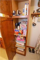 All Contents of (2) Cabinets- Towels, Cleaning,