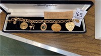 14 kt yellow gold charm bracelet with charms