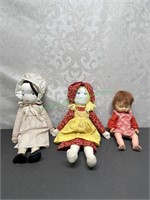 Two cloth and 1 plastic doll