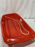 RED PLASTIC SNOW SLED 17 x35IN