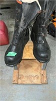 5 buckle rubber boots and wooden stand