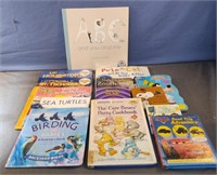 Childrens books including Snoopy, Care Bears,