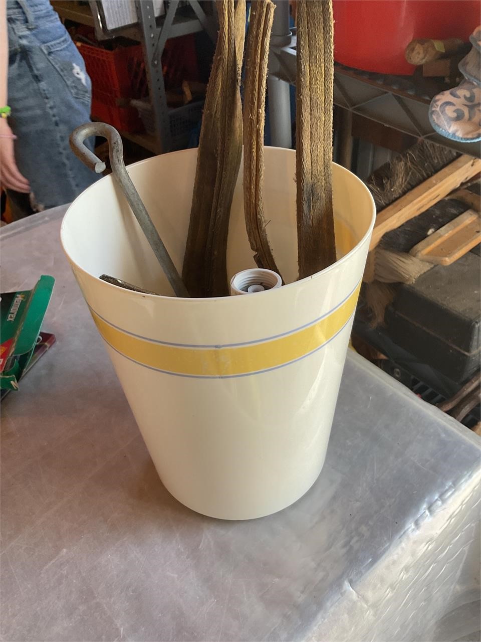 Small trash can w misc tools