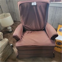 Older Recliner with fabric Cover.