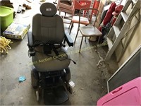 Jazzy 1107 motorized wheel chair w/charger.