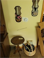 ROUND STAND, BASKET OF PHONES, WALL SCONCES