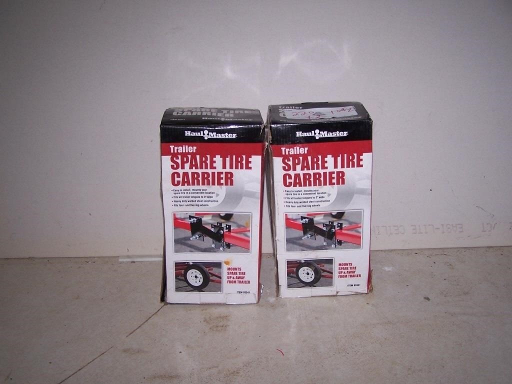 2 spare tire holders - appear new in box