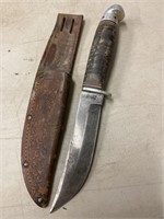 Western field hunting knife in tooled leather