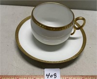 ELITE LIMOGES GOLD TRIM TEA CUP AND SAUCER