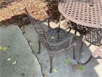 CAST METAL PATIO SET, 4 CHAIRS AND 33 IN DIAMETER