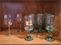 Green glass wine glasses (8), clear wine glasses