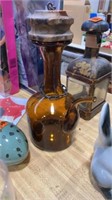Brown glass pourer with wooden stopper