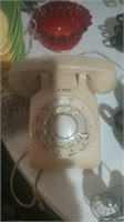 Old rotary dial beige desk phone
