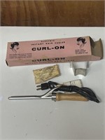 Vintage electric hair curler