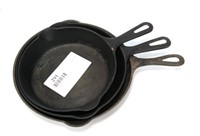 3- Medium cast iron Griswold pans