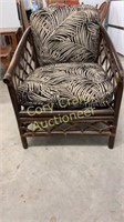 Rattan chair with black and beige palm leaves