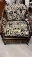 Rattan chair with black and beige palm leaves