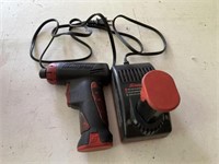 Snap-on cordless screwdriver with charger and