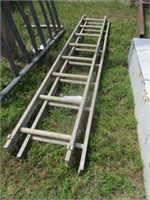 152) 2 sections of an extension ladder