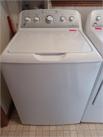 GE top load washing machine works