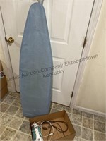 Ironing board with iron