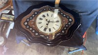 vintage clock (cracked and broken edges) with key