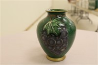 Sm. green vase w/ grape pattern