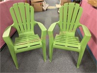 (2) Kids size green plastic outdoor chairs