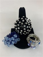 (3) Costume Jewelry rings, 2 have stretchy bands,