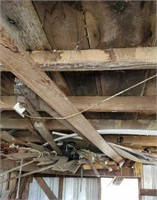 Grouping of wood hanging in rafter